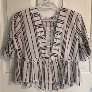 Cropped loose peplum top.